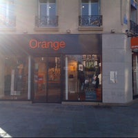 Photo taken at Boutique Orange by Teddy S. on 3/29/2012