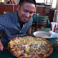Photo taken at Pasquale&amp;#39;s Pizza by Mariana C. on 7/4/2012