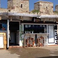 Photo taken at İskele Sancak Cafe by Murat D. on 7/9/2012
