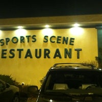 Photo taken at Sports Scene by Eric H. on 3/9/2012