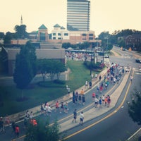 Photo taken at Peachtree Road Race Start Wave G by Ray R. on 7/4/2012