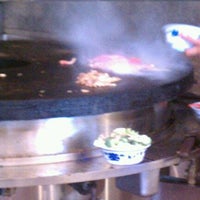 Photo taken at Yummy Mongolian Grill by Wilson T. on 6/6/2012