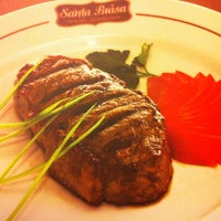 Photo taken at Santa Brasa Authentic Steaks by Aleandro P. on 7/18/2012