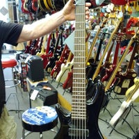 Photo taken at Southpaw Guitars by Nick R. on 7/4/2012