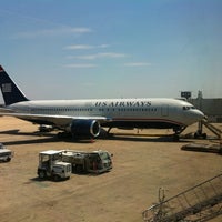 Photo taken at Gate A11 by Mike M. on 6/10/2012