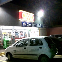 Photo taken at Oxxo by Robert J. on 2/10/2012