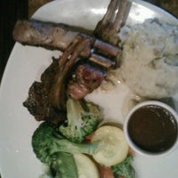 Photo taken at Outback Steakhouse by Meg S. on 7/8/2012
