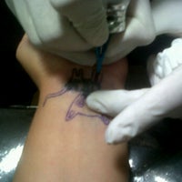 Photo taken at Bleed Skin Tattoo &amp;amp; Piercing by Daysz E. on 7/3/2012