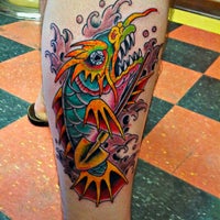 Photo taken at Trader Bob&amp;#39;s Tattoo Shop by A N. on 7/27/2012