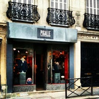Photo taken at Pigalle Neuf Store by Cristiano P. on 8/23/2012
