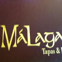 Снимок сделан в Malaga Tapas &amp; Bar пользователем Amanda W. 8/8/2012