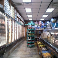 Photo taken at Galaxy Gourmet Deli by Kishow T. on 7/19/2012