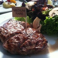 Photo taken at Buffalo Steak House by Alex S. on 8/5/2012