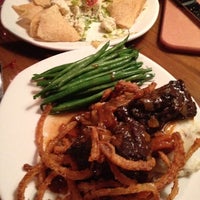 Photo taken at Outback Steakhouse by Tara J. on 3/15/2012