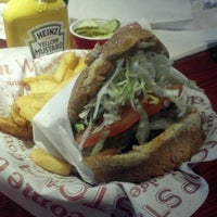 Photo taken at Red Robin Gourmet Burgers and Brews by Ben B. on 3/29/2012
