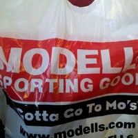 Photo taken at Modell&amp;#39;s Sporting Goods by Michael P. on 2/28/2012