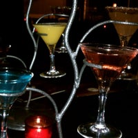 Photo taken at Downtown Main Martini Bar &amp;amp; Grille by Amelia B. on 5/12/2012