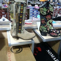Photo taken at DSW Designer Shoe Warehouse by Mel C. on 7/15/2012