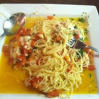 Photo taken at Portofino&amp;#39;s Italian Restaurant by Rebecca B. on 4/19/2012