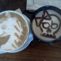 Photo taken at Wild Boar Coffee by June R. on 7/30/2012