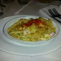 Photo taken at Romano&amp;#39;s Macaroni Grill by Gregory S. on 4/29/2012