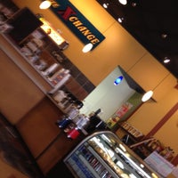 Photo taken at The Coffee Xchange by Elliot T. on 4/2/2012