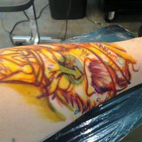 Photo taken at Artistic Skin Design and Body Piercing by Jesse S. on 3/3/2012
