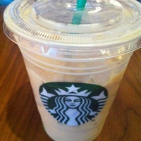 Photo taken at Starbucks by Julie B. on 3/20/2012