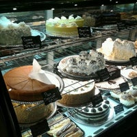 Photo taken at Manhattan Deli Bar and Grille by Karolyn P. on 6/30/2012