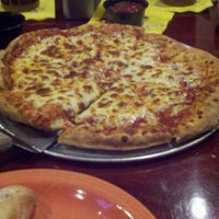 Photo taken at Rotolo&amp;#39;s Pizzeria by John R. on 3/2/2012