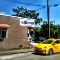 Photo taken at Magnolia Village Barber Shop by Robby D. on 7/25/2012