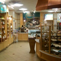 Photo taken at Rocky Mountain Chocolate Factory by Donna W. on 2/24/2012