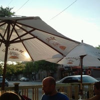 Photo taken at Division Street Bar &amp;amp; Grill by Ozden E. on 6/27/2012