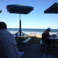 Photo taken at Surf 6 Oceanfront Grille &amp; Bar by Mark M. on 7/21/2012