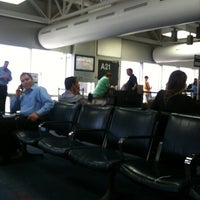 Photo taken at Gate A21 by Keith C. on 6/28/2012