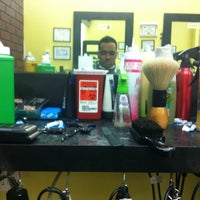 Photo taken at Corniell Barber Shop by Brian W. on 7/19/2012