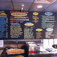 Photo taken at Snarf&amp;#39;s Sandwiches by Travis S. on 4/14/2012