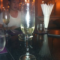 Photo taken at Salute Bistro &amp;amp; Wine Bar by Nunoi D. on 2/12/2012