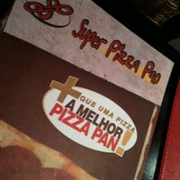 Photo taken at Super Pizza Pan by Noriaki J. on 3/25/2012