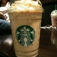 Photo taken at Starbucks by Marco R. on 3/19/2012
