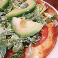 Photo taken at California Pizza Kitchen by Melissa L. on 5/23/2012