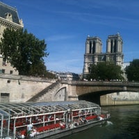 Photo taken at Quai Saint-Michel by Fryugnat on 7/22/2012