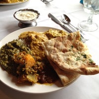 Photo taken at Royal Taj Indian Cuisine by Kate F. on 3/24/2012