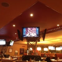 Photo taken at Sporting News Grill by Lance M. on 5/8/2012