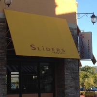 Photo taken at Sliders Bar &amp;amp; Grill by tutusshaveice T. on 6/19/2012