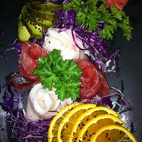Photo taken at Tomo Japanese Restaurant by Nate M. on 7/7/2012