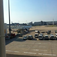 Photo taken at Gate D72 by Christian D. on 5/24/2012