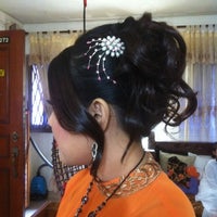 Photo taken at Xquizit Hair Design by Ouchy A. on 8/19/2012