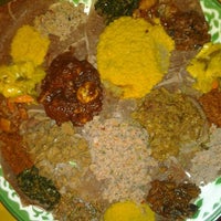 Photo taken at Aster&amp;#39;s Ethiopian Restaurant by Elijah W. on 2/26/2012