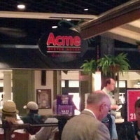 Photo taken at Acme Oyster House by Carlie M. on 3/17/2012